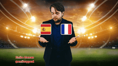 A Man Standing In Front Of A Stadium With A Spanish And French Flag GIF