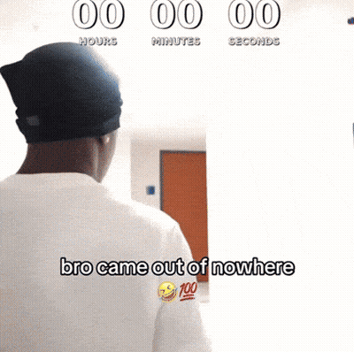 A Man Standing In Front Of A Wall That Says 00 Hours Minutes Seconds And Bro Came Out Of Nowhere GIF