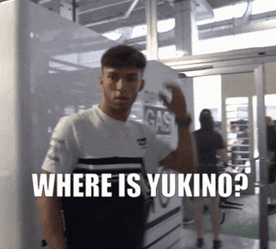 A Man Standing In Front Of A Wall With The Words Where Is Yukino On It GIF