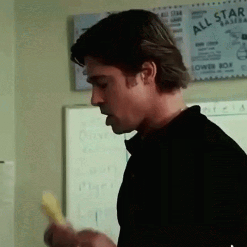 A Man Standing In Front Of A White Board That Says All Star On It GIF