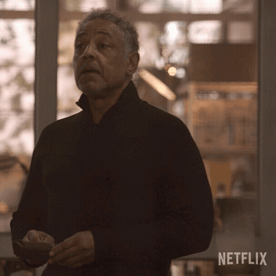 A Man Standing In Front Of A Window With A Netflix Logo On The Bottom GIF
