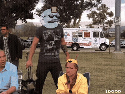 A Man Standing In Front Of An Ice Cream Truck That Says ' Ice Cream ' On It GIF