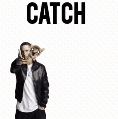 A Man Standing Next To A Cat With The Word Catch Written On It GIF