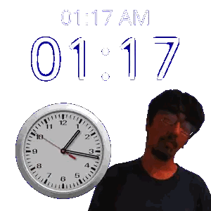 A Man Standing Next To A Clock That Says 1:17 Sticker