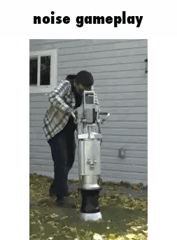 A Man Standing Next To A Machine That Says Noise Gameplay On The Bottom Sticker