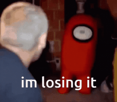 A Man Standing Next To A Red Among Us Character That Says I 'M Losing It . GIF