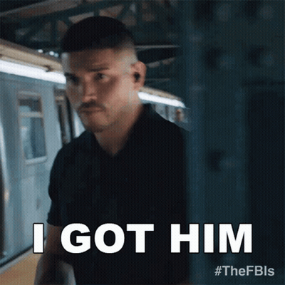 A Man Standing Next To A Train With The Words I Got Him GIF