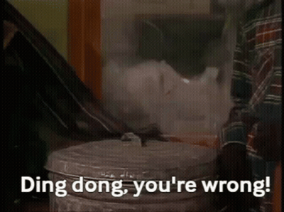A Man Standing Next To A Trash Can With The Words Ding Dong You 'Re Wrong Written On It GIF