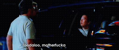 A Man Standing Next To Another Man In A Car With The Words Toodaloo Motherfucka On The Screen GIF