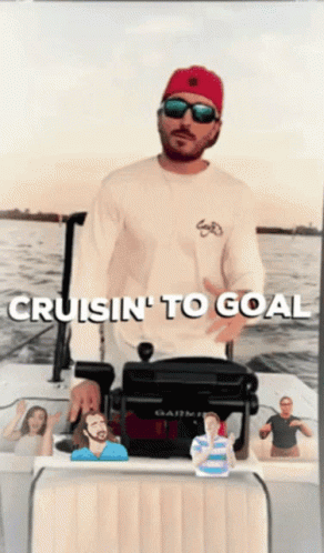 A Man Standing On A Boat With The Words Cruisin ' To Goal Written Above Him GIF