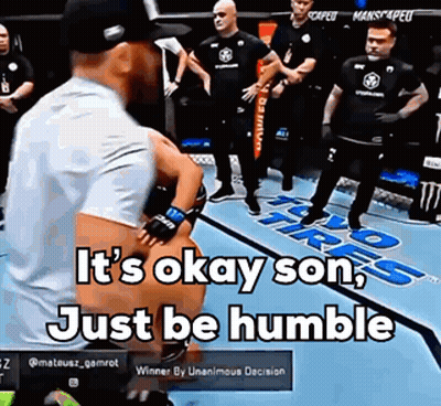A Man Standing On A Boxing Ring With The Words It 'S Okay Son Just Be Humble GIF