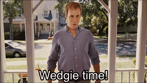 A Man Standing On A Porch With The Words Wedgie Time Written Below Him GIF