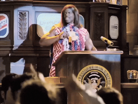A Man Stands At A Podium With A Pepsi Logo On The Wall Behind Him GIF