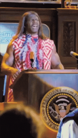 A Man Stands At A Podium With A Presidential Seal In Front Of Him GIF