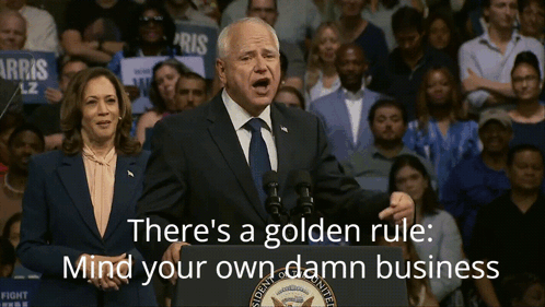 A Man Stands At A Podium With The Words There 'S A Golden Rule Mind Your Own Damn Business GIF