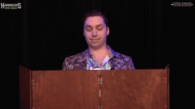 A Man Stands Behind A Podium That Says Just Wow On It GIF