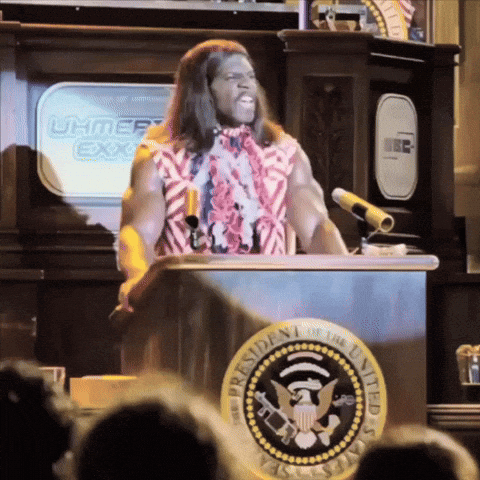 A Man Stands Behind A Podium With The Presidential Seal On It GIF