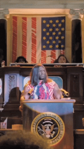 A Man Stands Behind A Podium With The Seal Of The President Of The United States GIF