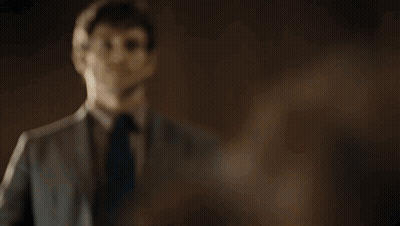 A Man Stands Behind A Podium With The Words Be It Your Own Hand Or The Hand Of God GIF