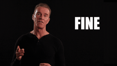 A Man Stands In Front Of A Black Background With The Words Fine And Dandy On It GIF