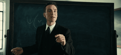 A Man Stands In Front Of A Blackboard With The Words It 'S Paradoxical And Yet It Works GIF