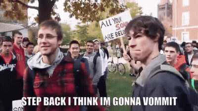 A Man Stands In Front Of A Crowd Holding A Sign That Says All Your Soul Are Belle GIF