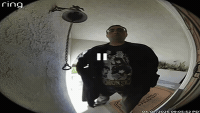 A Man Stands In Front Of A Door With A Welcome Mat GIF