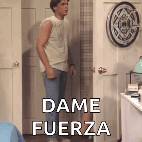 A Man Stands In Front Of A Door With Dame Fuerza Written On It GIF