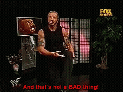 A Man Stands In Front Of A Fox Sports Advertisement GIF
