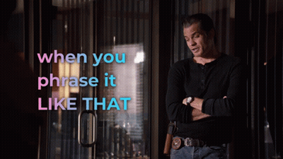 A Man Stands In Front Of A Glass Door With The Words When You Phrase It Like That Above Him GIF