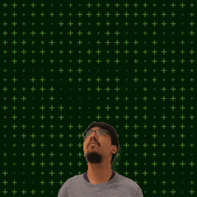 A Man Stands In Front Of A Green Background With The Number 10 + 16 Written On It GIF