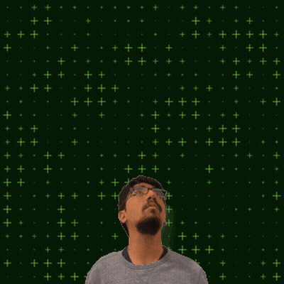 A Man Stands In Front Of A Green Background With The Number 15 + 8 On It GIF
