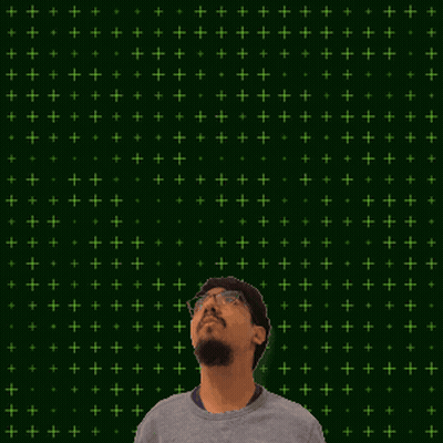 A Man Stands In Front Of A Green Background With The Number 16 On It GIF