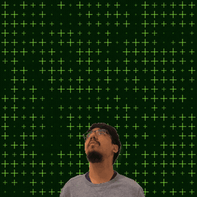 A Man Stands In Front Of A Green Background With The Number 19 On It GIF