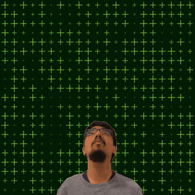 A Man Stands In Front Of A Green Background With The Number 21 In Yellow GIF