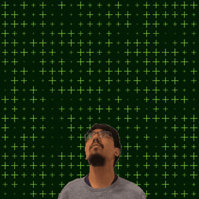 A Man Stands In Front Of A Green Background With The Number 21 In Yellow GIF