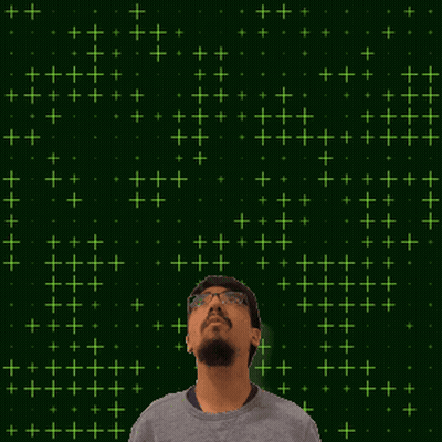 A Man Stands In Front Of A Green Background With The Number 28 GIF