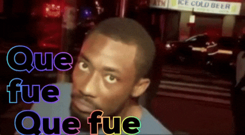 A Man Stands In Front Of A Ice Cold Beer Sign GIF