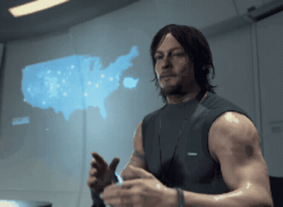 A Man Stands In Front Of A Map Of The United States Of America GIF
