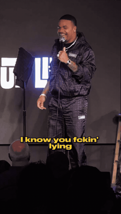 A Man Stands In Front Of A Microphone And Says " I Know You Fckin Lying " GIF