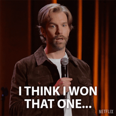 A Man Stands In Front Of A Microphone And Says I Think I Won That One GIF
