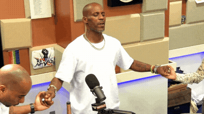 A Man Stands In Front Of A Microphone With A Sign That Says Respect My Vote GIF