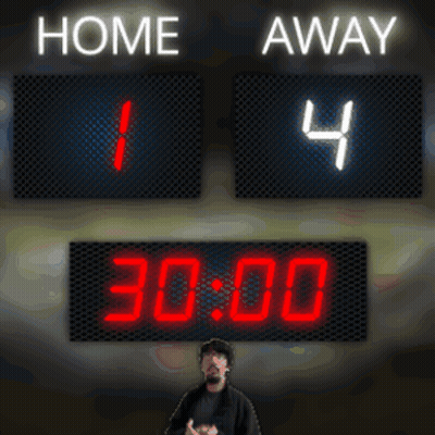 A Man Stands In Front Of A Scoreboard Which Says Home 1 And Away 4 GIF