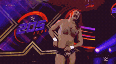 A Man Stands In Front Of A Sign That Says 205 GIF