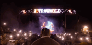 A Man Stands In Front Of A Stage That Says Astroworld On It GIF