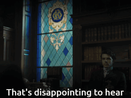 A Man Stands In Front Of A Stained Glass Window With The Words That 'S Disappointing To Hear GIF