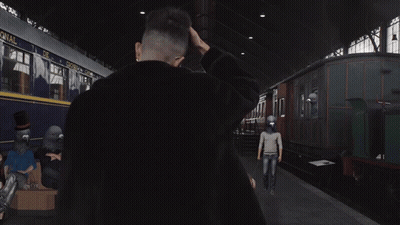 A Man Stands In Front Of A Train That Has The Word Canal On It GIF