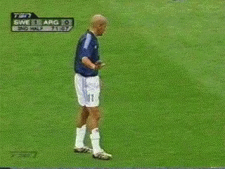 A Man Stands In Front Of A Tv Screen That Says Tsn On It GIF