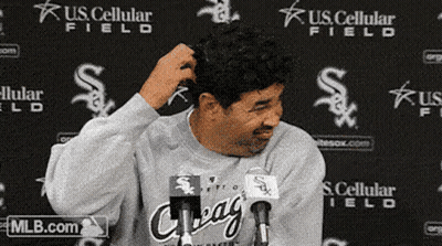 A Man Stands In Front Of A U.s. Cellular Field Background GIF