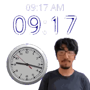 A Man Stands In Front Of A Wall Clock That Says 9:17 Am Sticker